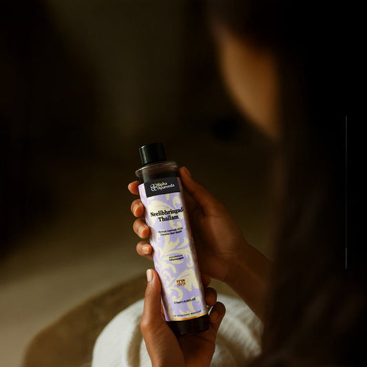 How to Apply Neelibringadi Thailam for Hair Growth
