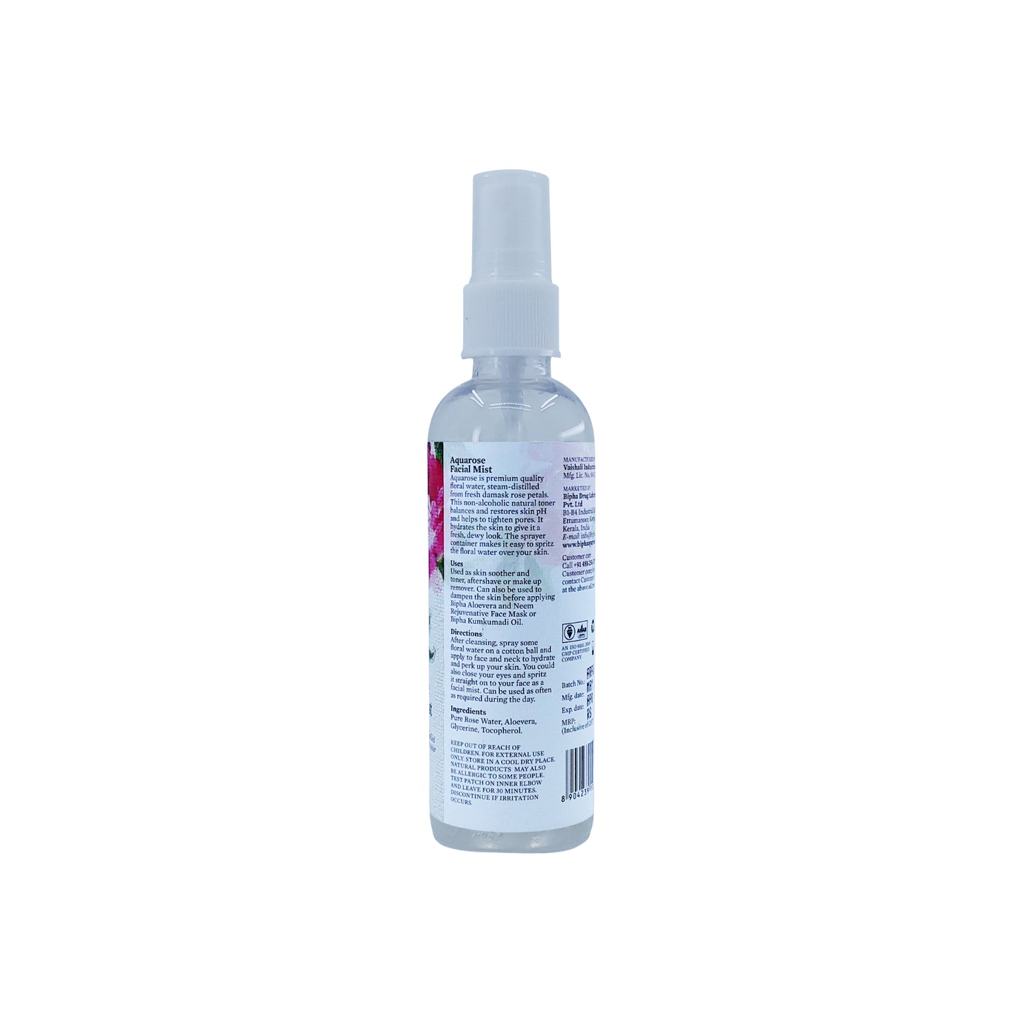 Facial mist spray bottle with white pump sprayer, back label facing up.