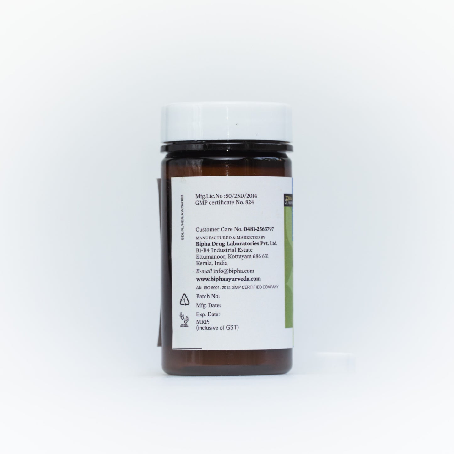 Spirulina supplement bottle with ingredient information panel on back, black cap.