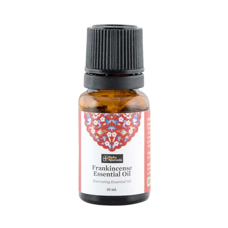 Frankincense essential oil bottle with amber liquid and red floral label, 10 ml