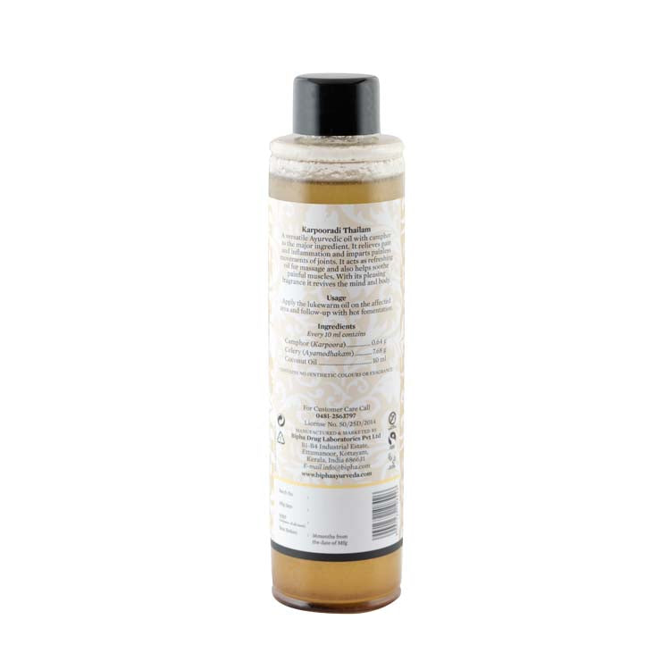 Ayurvedic oil bottle showing the back label text, with black cap included.
