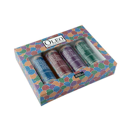 Cold-pressed oil combo box, top view, with four colored oil bottles