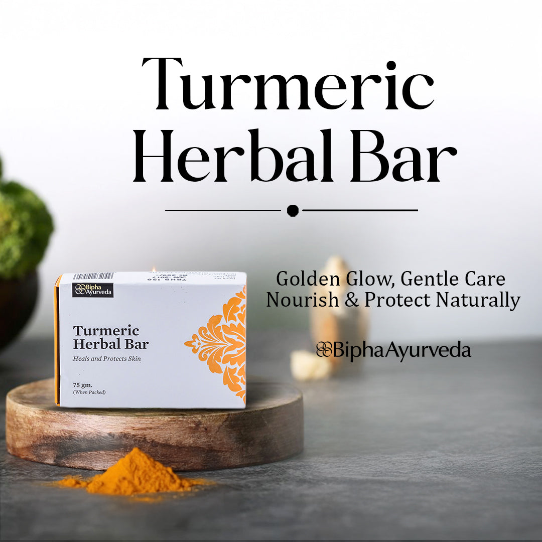 Turmeric herbal bar on round wooden base with white box and turmeric powder