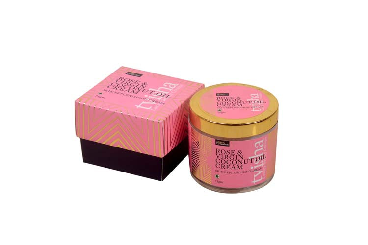 Rose & Virgin Coconut Oil cream jar with gold lid next to pink carton box