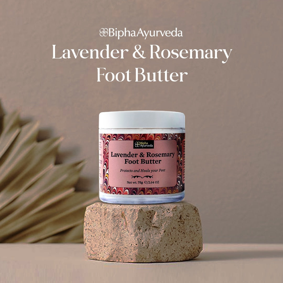 Lavender and rosemary foot butter jar standing on stone