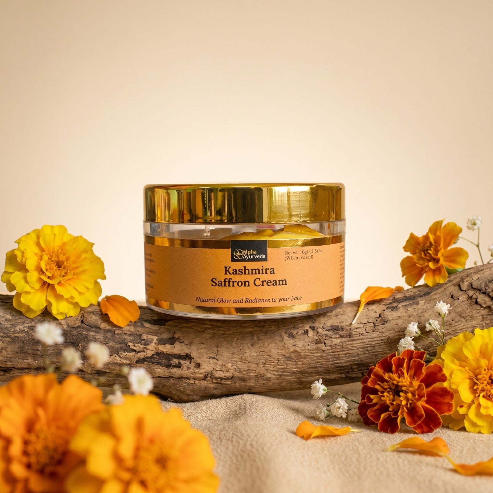 Saffron night cream jar with gold lid on wood with marigold flowers