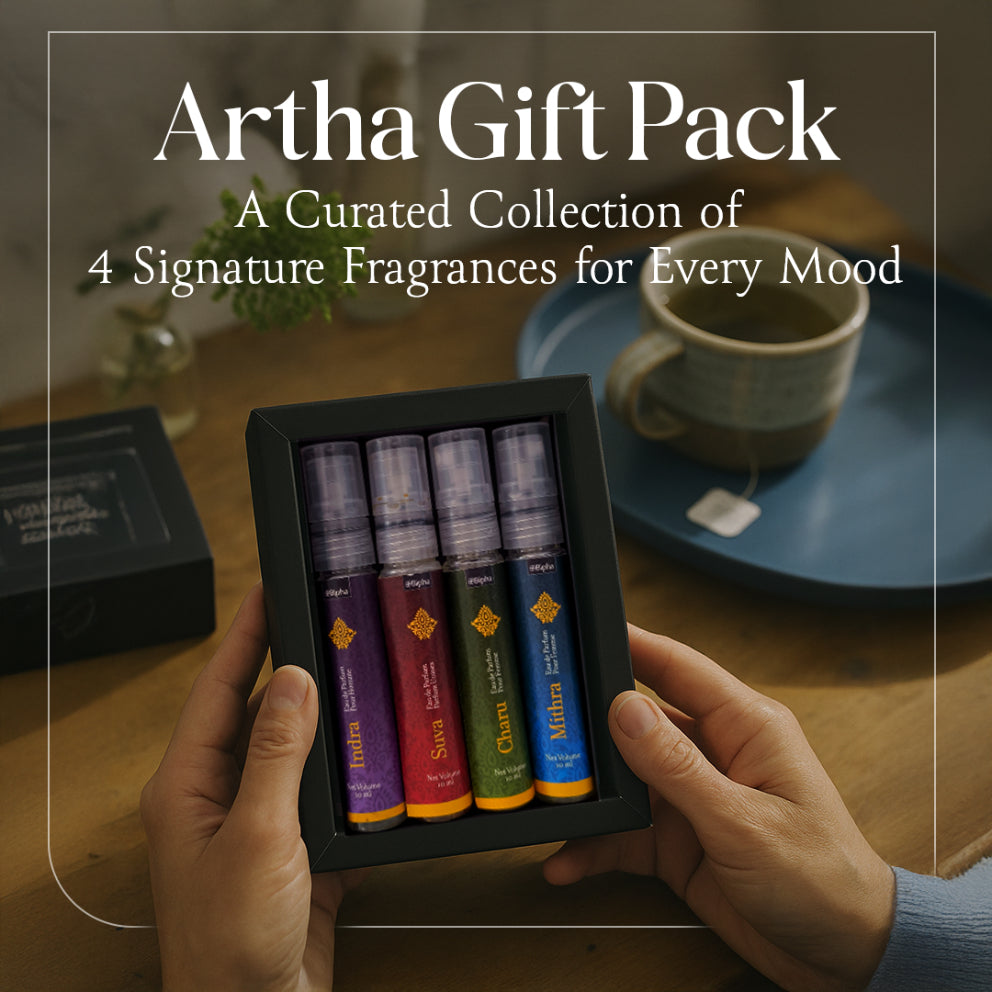 Artha Gift Pack gift box with four mini fragrance bottles in purple, red, green, blue