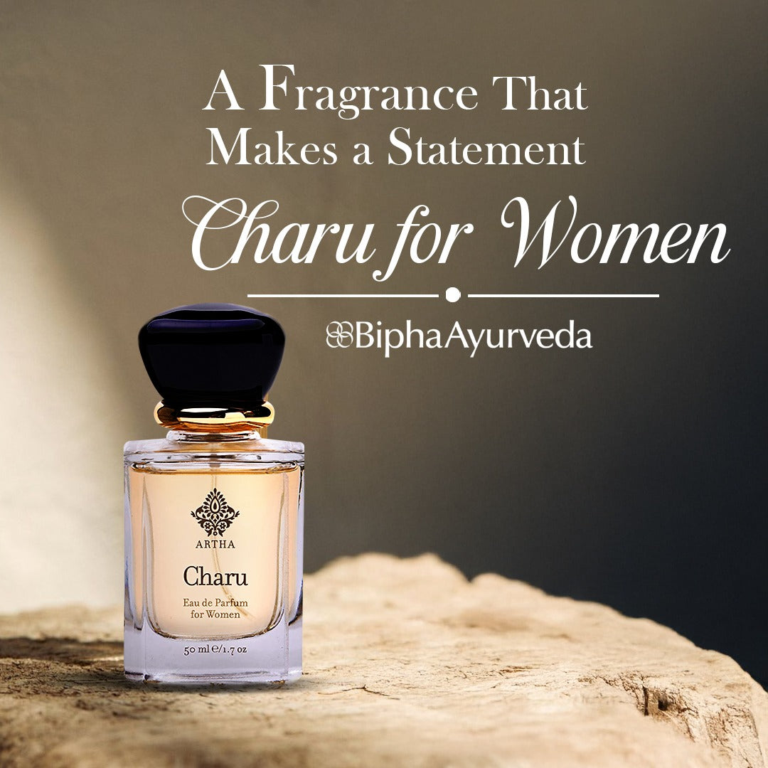 Women's eau de parfum bottle with black cap on textured surface