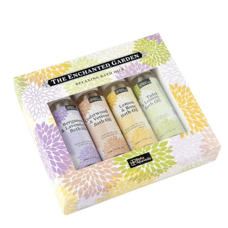 Bath oil gift set box with four mini bottles, shown at an angle