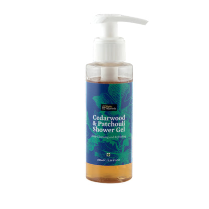 Cedarwood and Patchouli shower gel bottle with white pump, blue front label