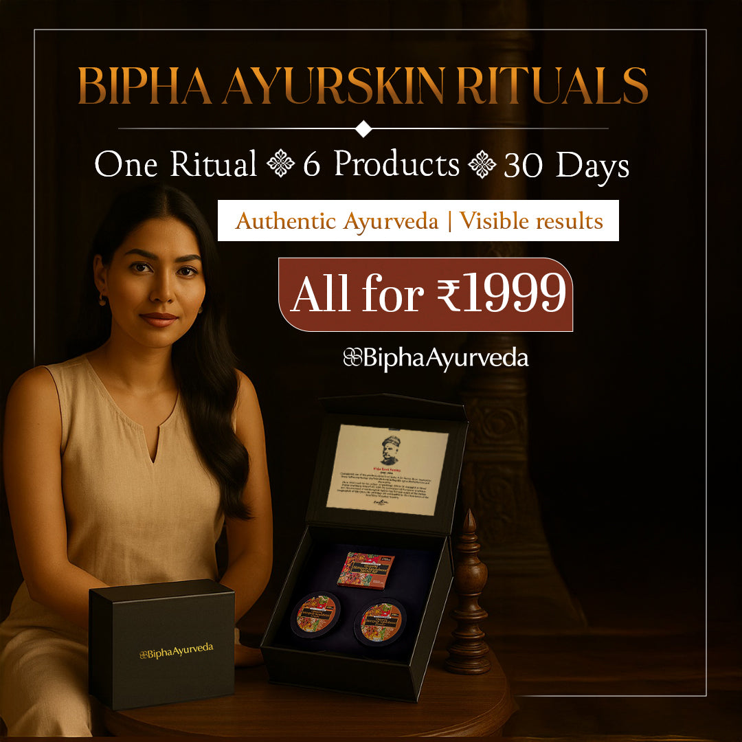 Ayurvedic skincare set on tray with black-lidded jars and product boxes