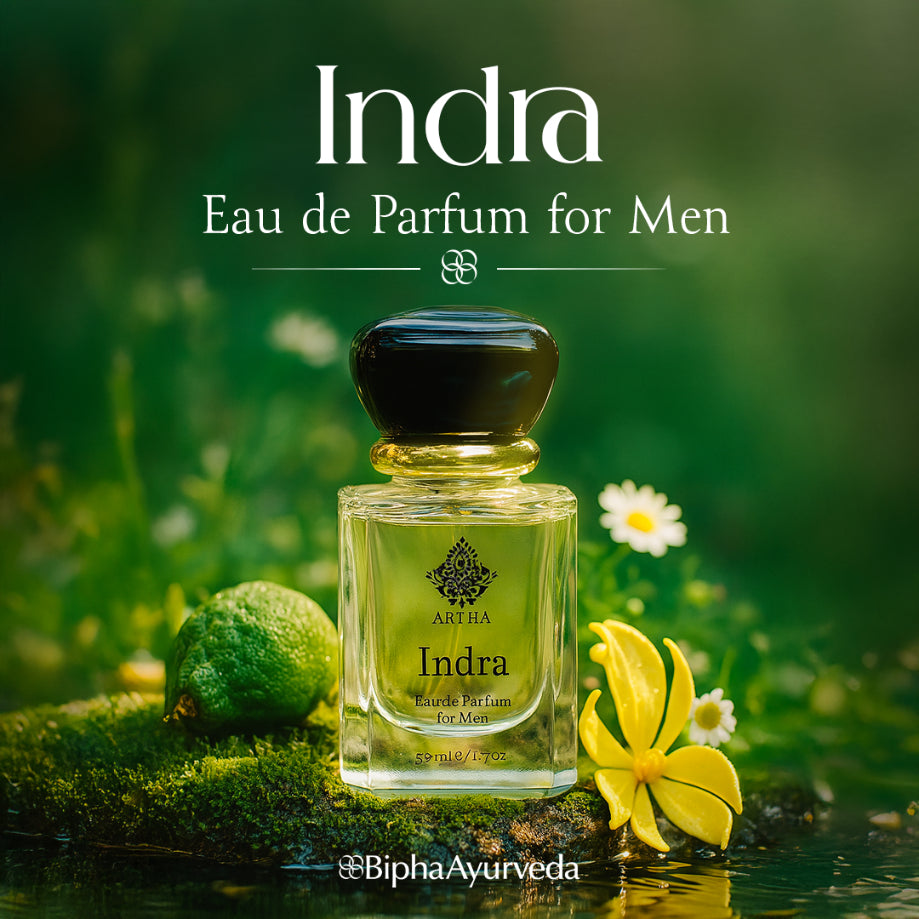 Indra eau de parfum bottle with black cap and white flower accents
